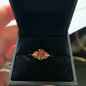 14k garnet ring with 2 small diamonds